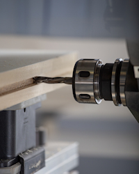 Door router machining a groove